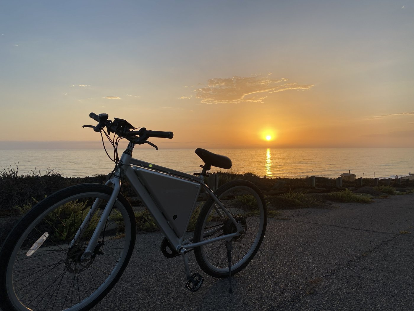 E-bike on a coastal path at sunset